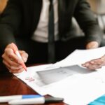 Business owner reviewing entity formation paperwork